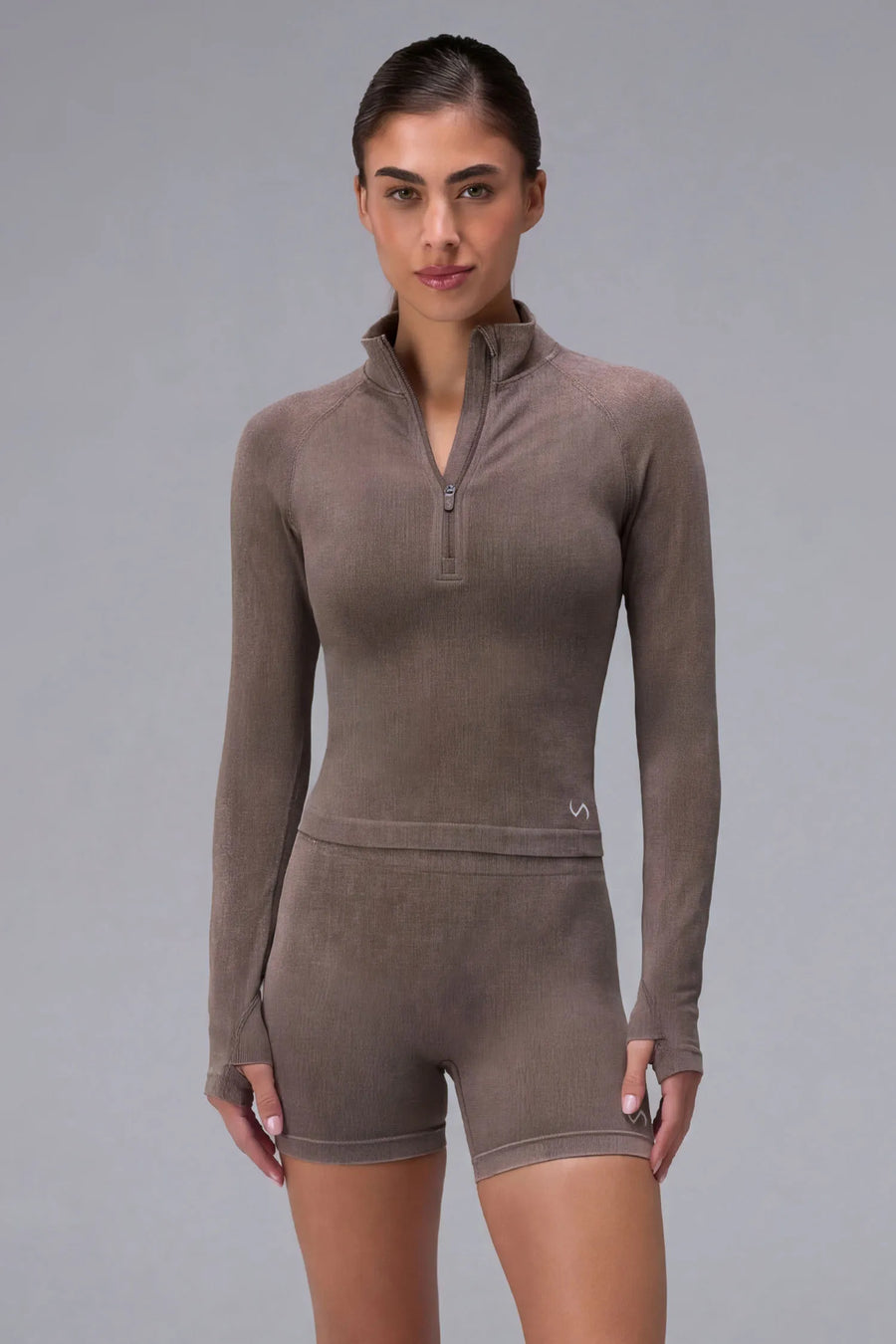 Brown Cosmic Seamless 1/4 Zip, seamless long sleeve workout top with cropped fit and quarter zip neckline for gym training and workouts by TLF Apparel – front view 