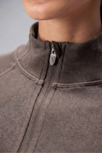 Brown Cosmic Seamless 1/4 Zip showing sculpted side fit and breathable seamless knit fabric by TLF Apparel – detail view 