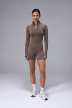 Brown Cosmic Seamless 1/4 Zip with raglan sleeves and seamless sculpting fit for workouts and training by TLF Apparel – front view 