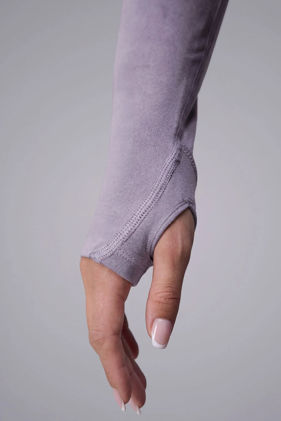 Gray Cosmic Seamless 1/4 Zip showing fitted side silhouette and sculpting seamless fabric by TLF Apparel – detail view