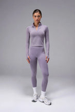Gray Cosmic Seamless 1/4 Zip with raglan sleeves and seamless sculpting fit for workouts and training by TLF Apparel – front view 