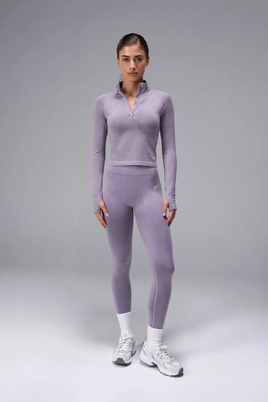 Gray Cosmic Seamless 1/4 Zip with raglan sleeves and seamless sculpting fit for workouts and training by TLF Apparel – front view 