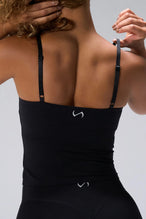 Black NeoCloud™ Built In Bra Tank showing longline fit and breathable cloud-soft fabric by TLF Apparel – back view