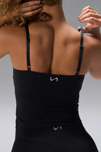 Black NeoCloud™ Built In Bra Tank showing longline fit and breathable cloud-soft fabric by TLF Apparel – back view