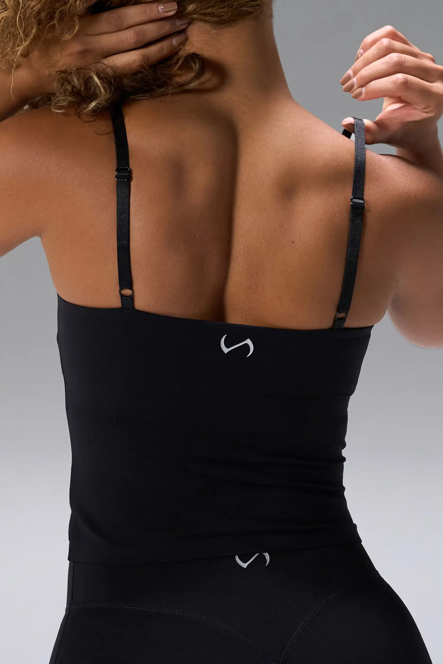Black NeoCloud™ Built In Bra Tank showing longline fit and breathable cloud-soft fabric by TLF Apparel – back view