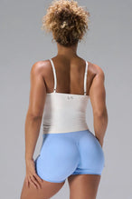 Cream NeoCloud™ Built In Bra Tank showing longline fit and breathable cloud-soft fabric by TLF Apparel – back view