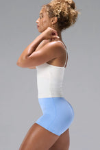 Cream NeoCloud™ Built In Bra Tank showing side silhouette, adjustable straps, and shelf bra support by TLF Apparel – side view
