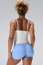 Cream NeoCloud™ Built In Bra Tank showing longline fit and breathable cloud-soft fabric by TLF Apparel – back view