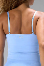 Blue NeoCloud™ Built In Bra Tank showing longline fit and breathable cloud-soft fabric by TLF Apparel – back view