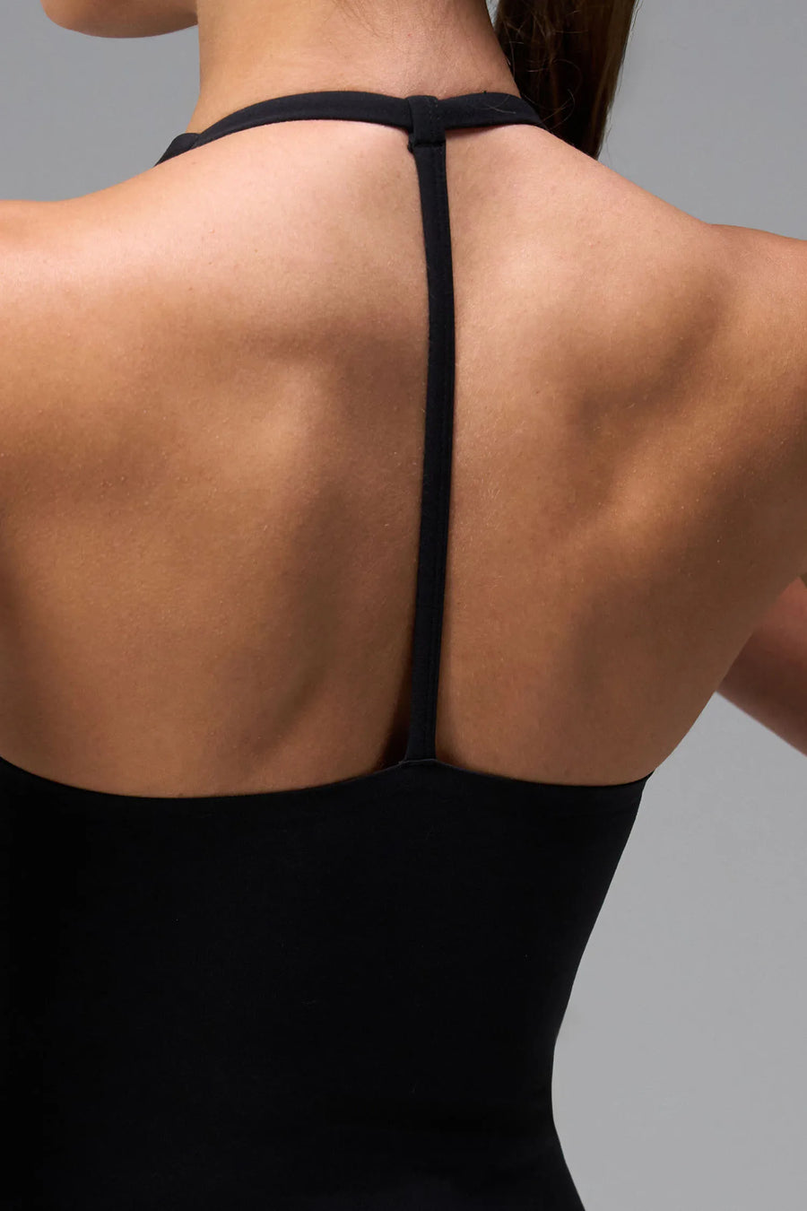 Black NeoCloud™ Double Layer Tank Top with medium support for the studio classes, pilates and gym training by TLF Apparel – back view  