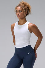 White Essential Ribbed Tank Top, a fitted high neck cropped tank top in soft rib knit by TLF Apparel – front view