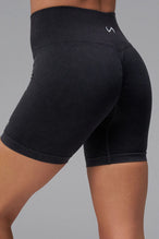 Black Cosmic Seamless Scrunch Butt Shorts with booty shaping ruching and glute contour seam for workouts and gym training by TLF Apparel – back view 