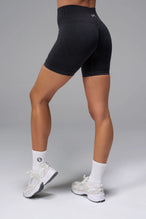 Black Cosmic Seamless Scrunch Butt Shorts with booty shaping ruching and glute contour seam for workouts and gym training by TLF Apparel – back view 