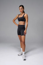 Black Cosmic Seamless Scrunch Butt Shorts with booty shaping ruching and glute contour seam for workouts and gym training by TLF Apparel – front view 