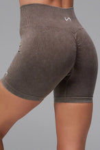 Brown Cosmic Seamless Scrunch Butt Shorts with booty shaping ruching and glute contour seam for workouts and gym training by TLF Apparel – back view 