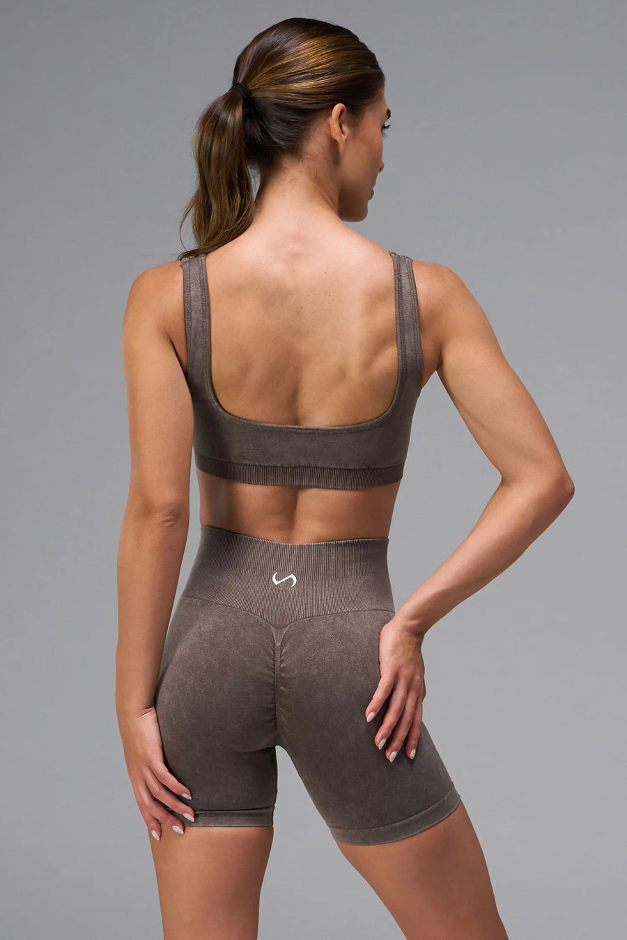 Brown Cosmic Seamless Scrunch Butt Shorts with booty shaping ruching and glute contour seam for workouts and gym training by TLF Apparel – back view 