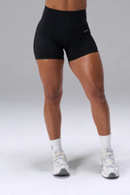 Black NeoCloud™ 4 Inch Secret Glute Seam Shorts with 4 inch inseam and scrunch lift, daily wear by TLF Apparel – front view
