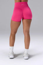 Pink NeoCloud™ 4 Inch Secret Glute Seam Shorts showing scrunch lift and sculpted silhouette by TLF Apparel – back view
