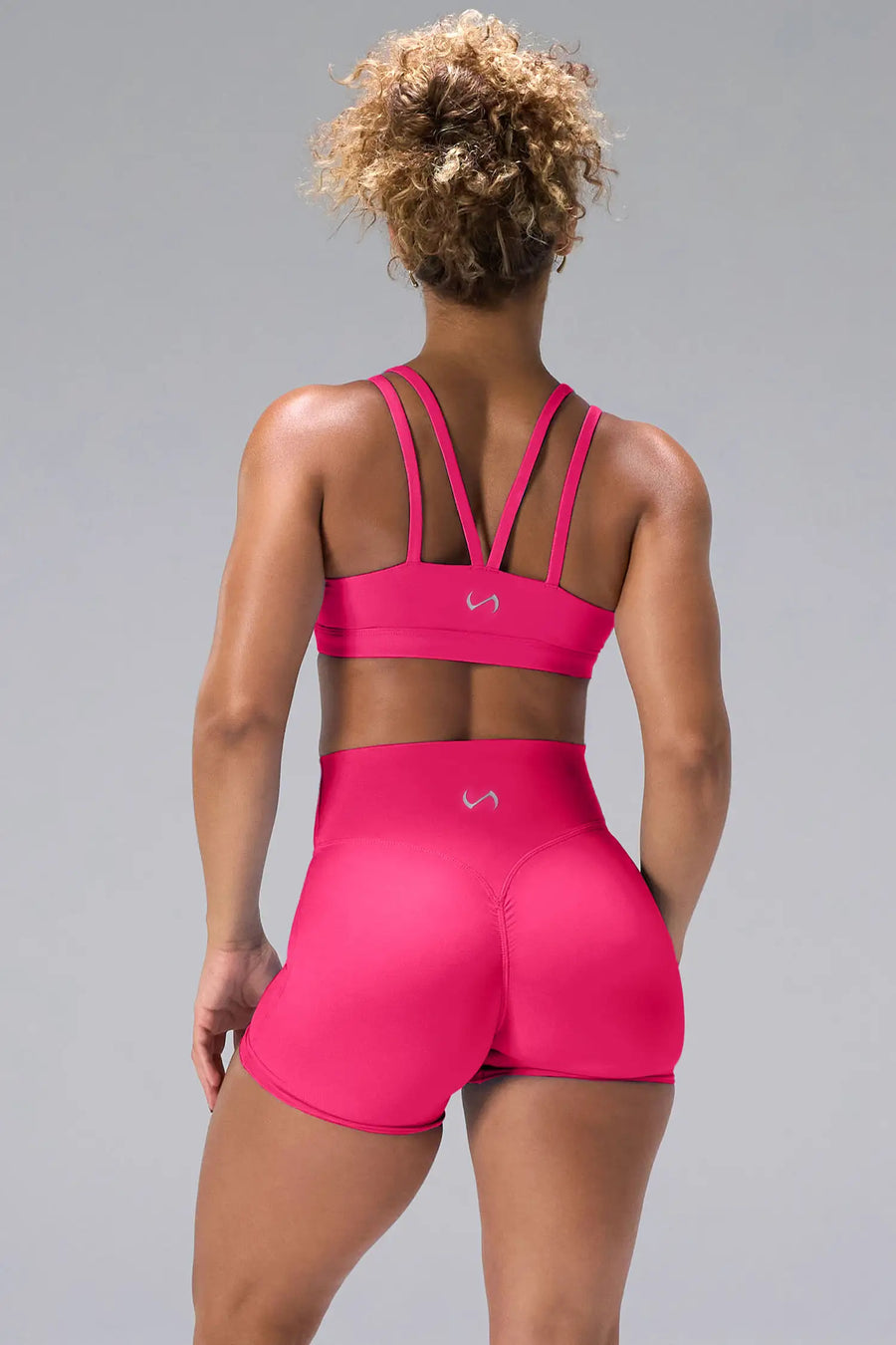 Pink NeoCloud™ 4 Inch Secret Glute Seam Shorts showing NeoCloud™ fabric and 4 inch inseam by TLF Apparel – back view