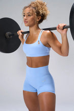 Blue NeoCloud™ 4 Inch Secret Glute Seam Shorts showing scrunch lift, sculpted fit, soft fabric by TLF Apparel – side view 