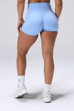 Blue NeoCloud™ 4 Inch Secret Glute Seam Shorts showing scrunch lift and sculpted silhouette by TLF Apparel – back view 