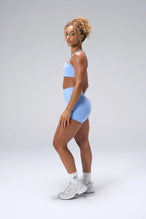 Blue NeoCloud™ 4 Inch Secret Glute Seam Shorts showing scrunch lift, sculpted fit, soft fabric by TLF Apparel – side view