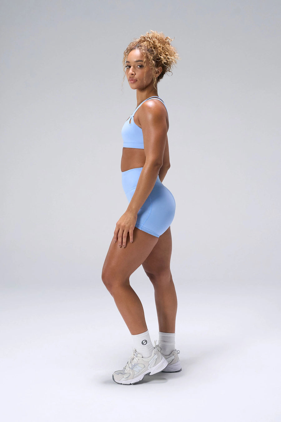 Blue NeoCloud™ 4 Inch Secret Glute Seam Shorts showing scrunch lift, sculpted fit, soft fabric by TLF Apparel – side view