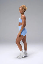 Blue NeoCloud™ 4 Inch Secret Glute Seam Shorts showing scrunch lift, sculpted fit, soft fabric by TLF Apparel – side view