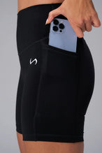 Black Tempo 6 Inch Gym Shorts With Pockets showing sculpted fit and dual side phone pockets by TLF Apparel – side view