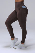 Brown Tempo Leggings With Pockets in Luxe DNA™ fabric with high waisted sculpting waistband by TLF Apparel – front view