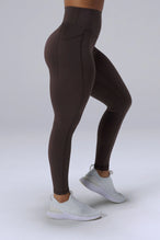 Brown Tempo Leggings With Pockets showing sculpted fit and dual side phone pockets by TLF Apparel – side view