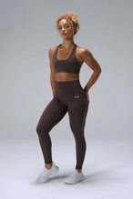 Brown Tempo Leggings With Pockets showing sculpted thigh and full-length leg silhouette by TLF Apparel – front view