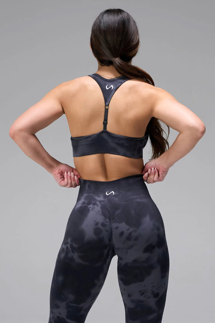 Back View of Meteorite TLF Cosmic Seamless Scrunch Butt Leggings, featuring a scrunch butt to shape and contour your glutes 