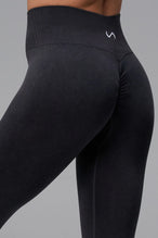 Black Cosmic Seamless Scrunch Butt Leggings with sculpting seamless fabric and supportive ribbed waistband for gym workouts and training by TLF Apparel – front view 