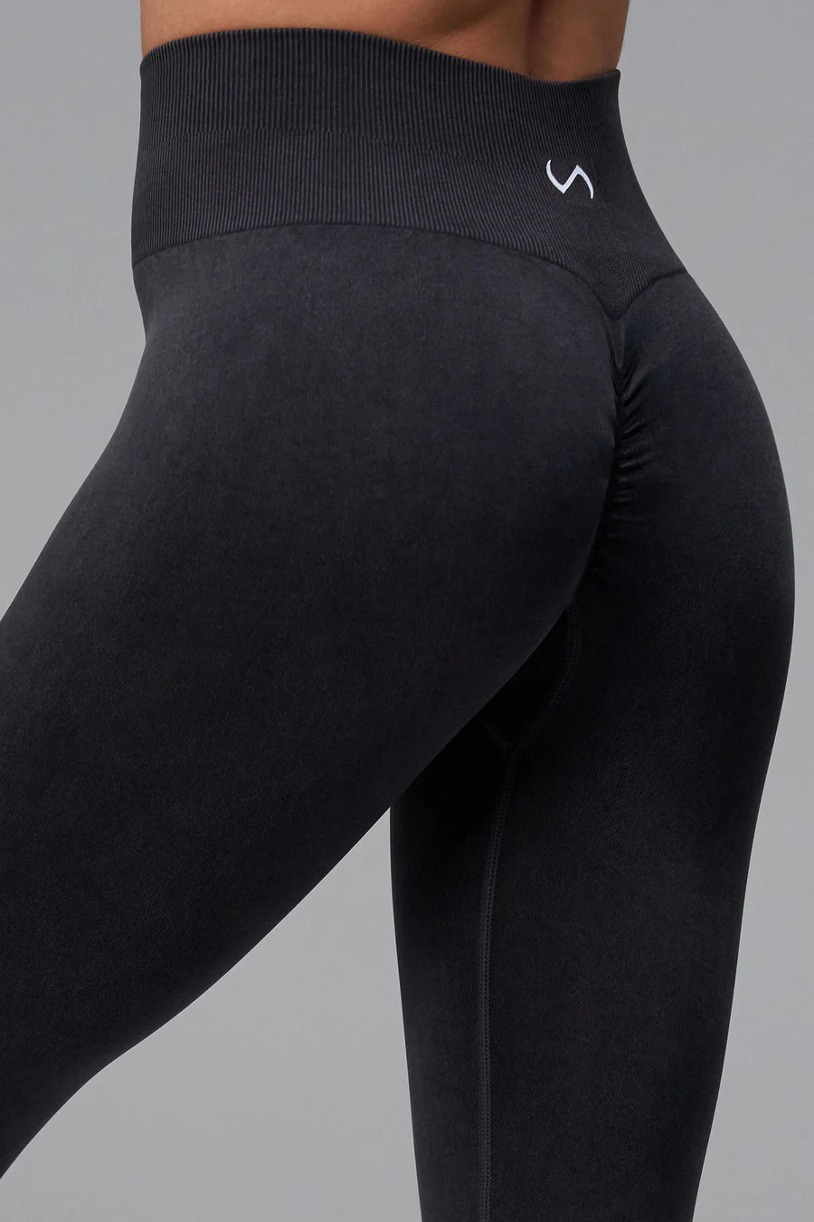 Black Cosmic Seamless Scrunch Butt Leggings with sculpting seamless fabric and supportive ribbed waistband for gym workouts and training by TLF Apparel – front view 