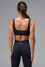 Black Cosmic Seamless Scrunch Butt Leggings showing fitted side silhouette and sculpting seamless fabric by TLF Apparel – side view 