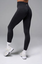 Black Cosmic Seamless Scrunch Butt Leggings showing sculpted side fit and supportive ribbed waistband by TLF Apparel – side view 