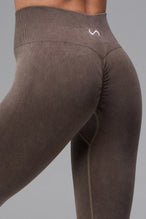 Brown Cosmic Seamless Scrunch Butt Leggings with sculpting seamless fabric and supportive ribbed waistband for gym workouts and training by TLF Apparel – front view 