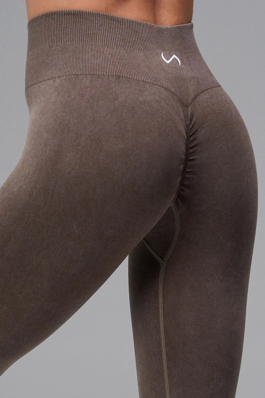Brown Cosmic Seamless Scrunch Butt Leggings with sculpting seamless fabric and supportive ribbed waistband for gym workouts and training by TLF Apparel – front view 