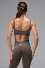 Brown Cosmic Seamless Scrunch Butt Leggings showing fitted side silhouette and sculpting seamless fabric by TLF Apparel – side view 