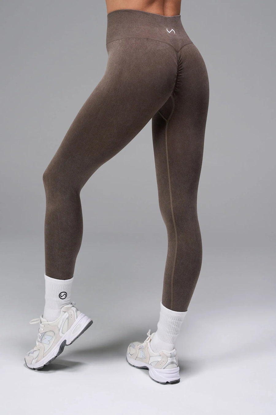 Brown Cosmic Seamless Scrunch Butt Leggings showing sculpted side fit and supportive ribbed waistband by TLF Apparel – side view 