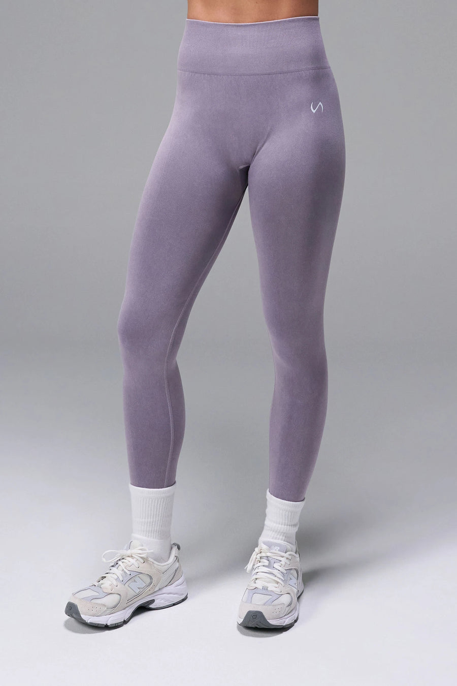 Gray Cosmic Seamless Scrunch Butt Leggings with booty shaping ruching and glute contour seam for gym training and workouts by TLF Apparel – back view 