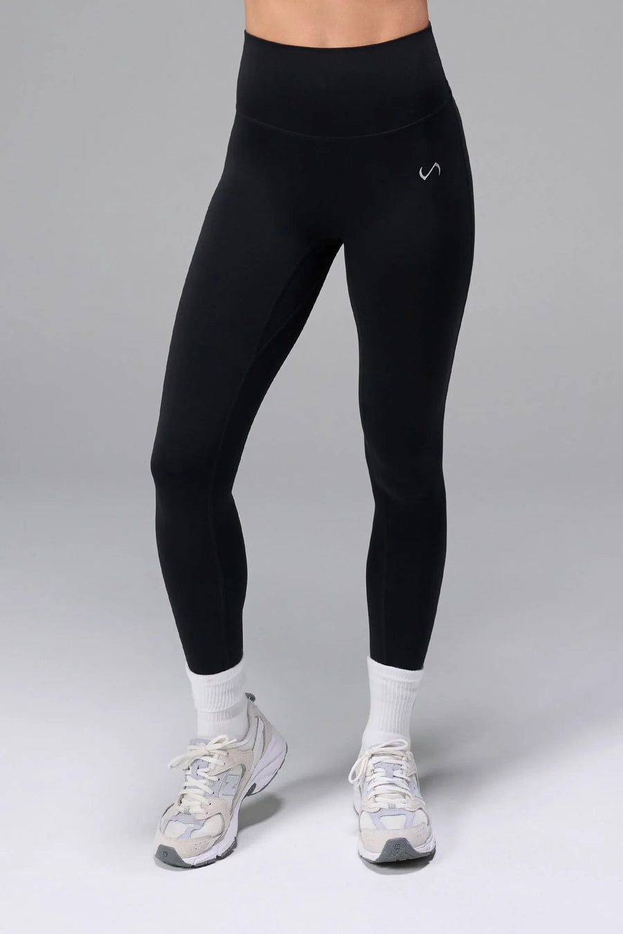 Front View of Black TLF NeoCloud™ Secret Glute Seam Leggings featuring our new secret glute seam technology to lift and shape your glutes. 