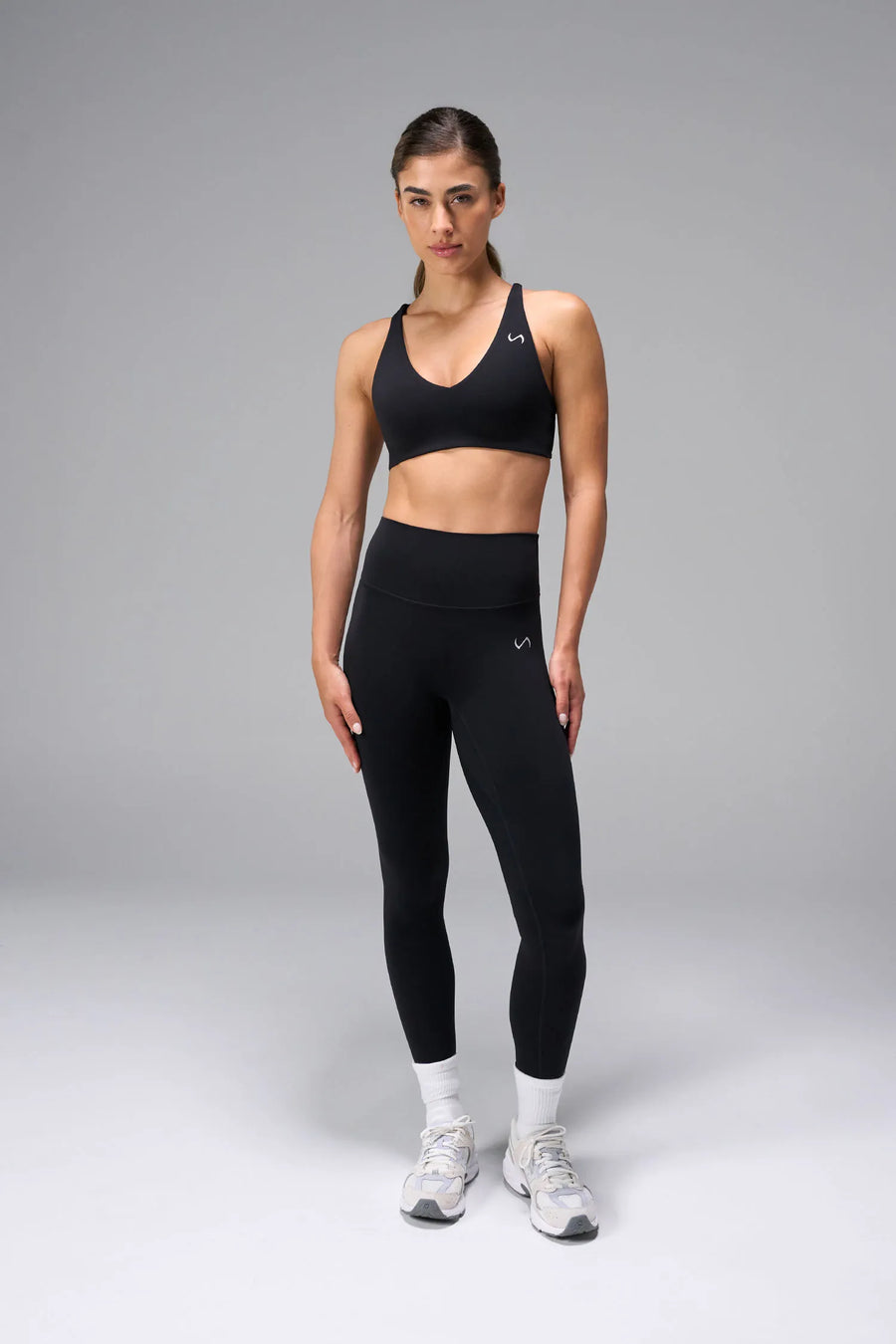Front View of Black TLF NeoCloud™ Secret Glute Seam Leggings featuring our new secret glute seam technology to lift and shape your glutes. 