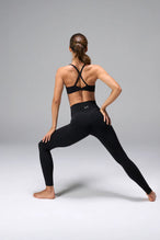Front View of Black TLF NeoCloud™ Secret Glute Seam Leggings featuring our new secret glute seam technology to lift and shape your glutes. 