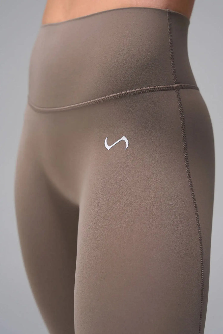 Front View of Falcon TLF NeoCloud™ Secret Glute Seam Leggings featuring our new secret glute seam technology to lift and shape your glutes. 