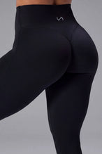 Black NeoCloud™ Secret Glute Seam Leggings showing scrunch lift and sculpted glute silhouette by TLF Apparel – back view