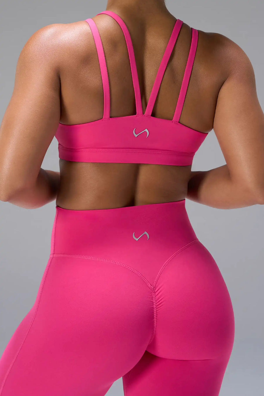 Pink NeoCloud™ Secret Glute Seam Leggings showing scrunch lift, sculpted fit, soft fabric by TLF Apparel – back view