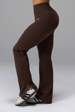 Side View of Brown TLF Tempo High Waisted Split Hem Leggings feature our Luxe DNA fabric with a side split hem for style versatility