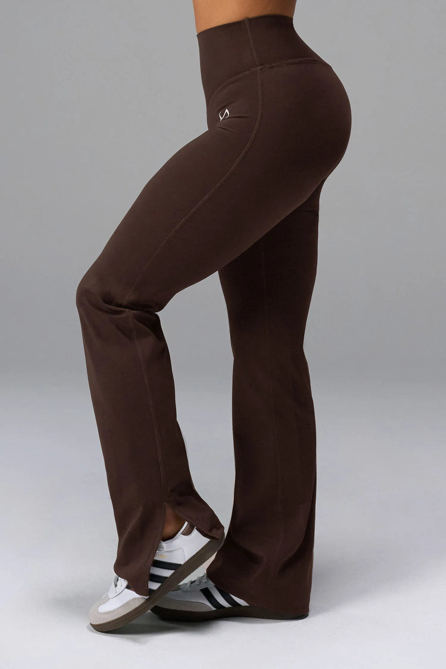 Side View of Brown TLF Tempo High Waisted Split Hem Leggings feature our Luxe DNA fabric with a side split hem for style versatility